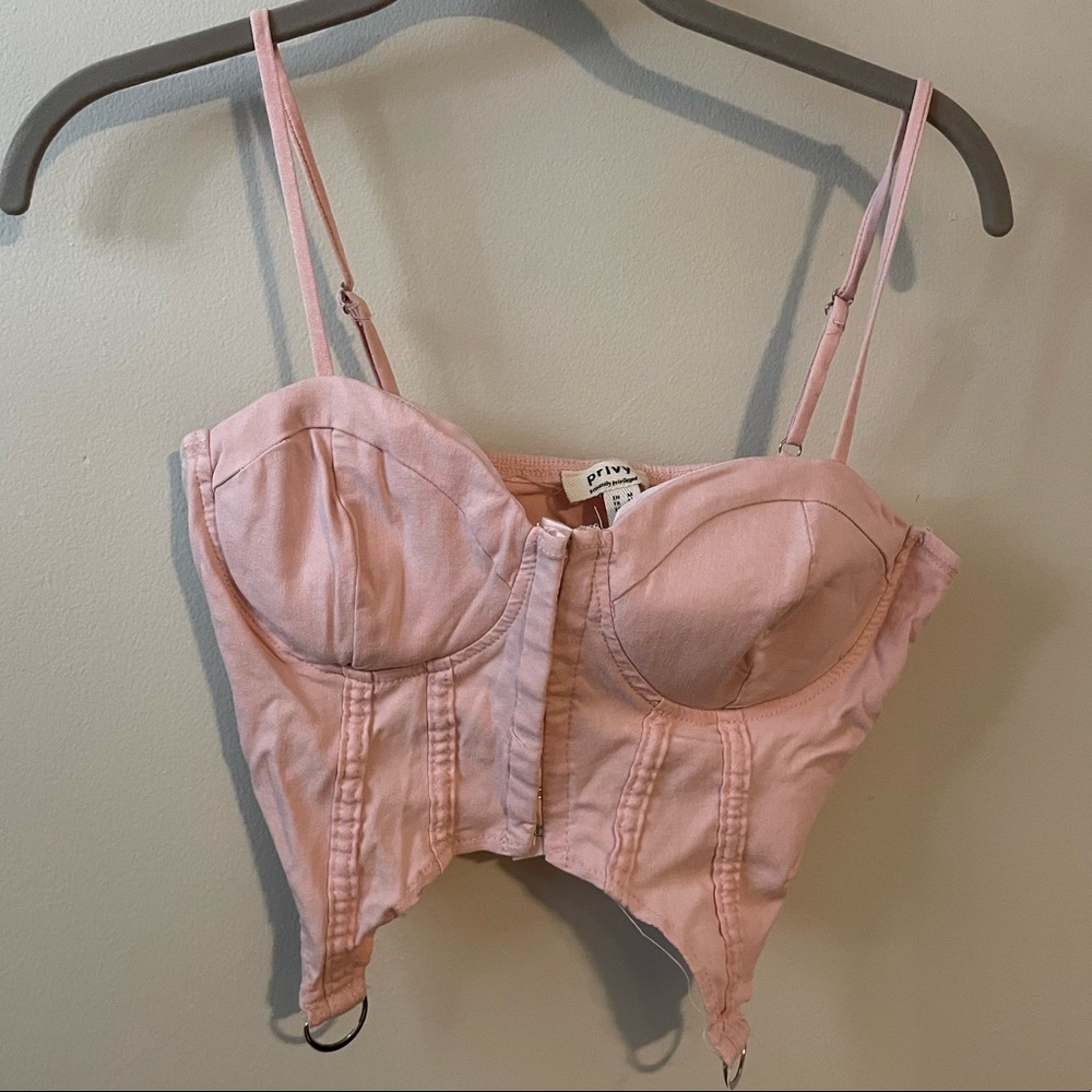 Pink cropped corset going out top